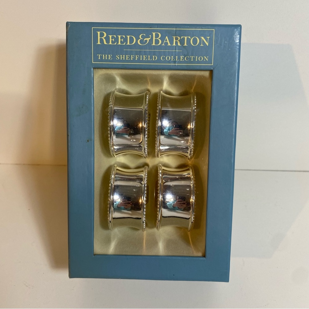 NIB Set Of 4 Reed & Barton Silver Plate Napkin Rings